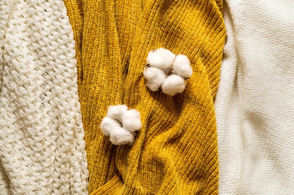 Pile of knitted clothes cotton flower